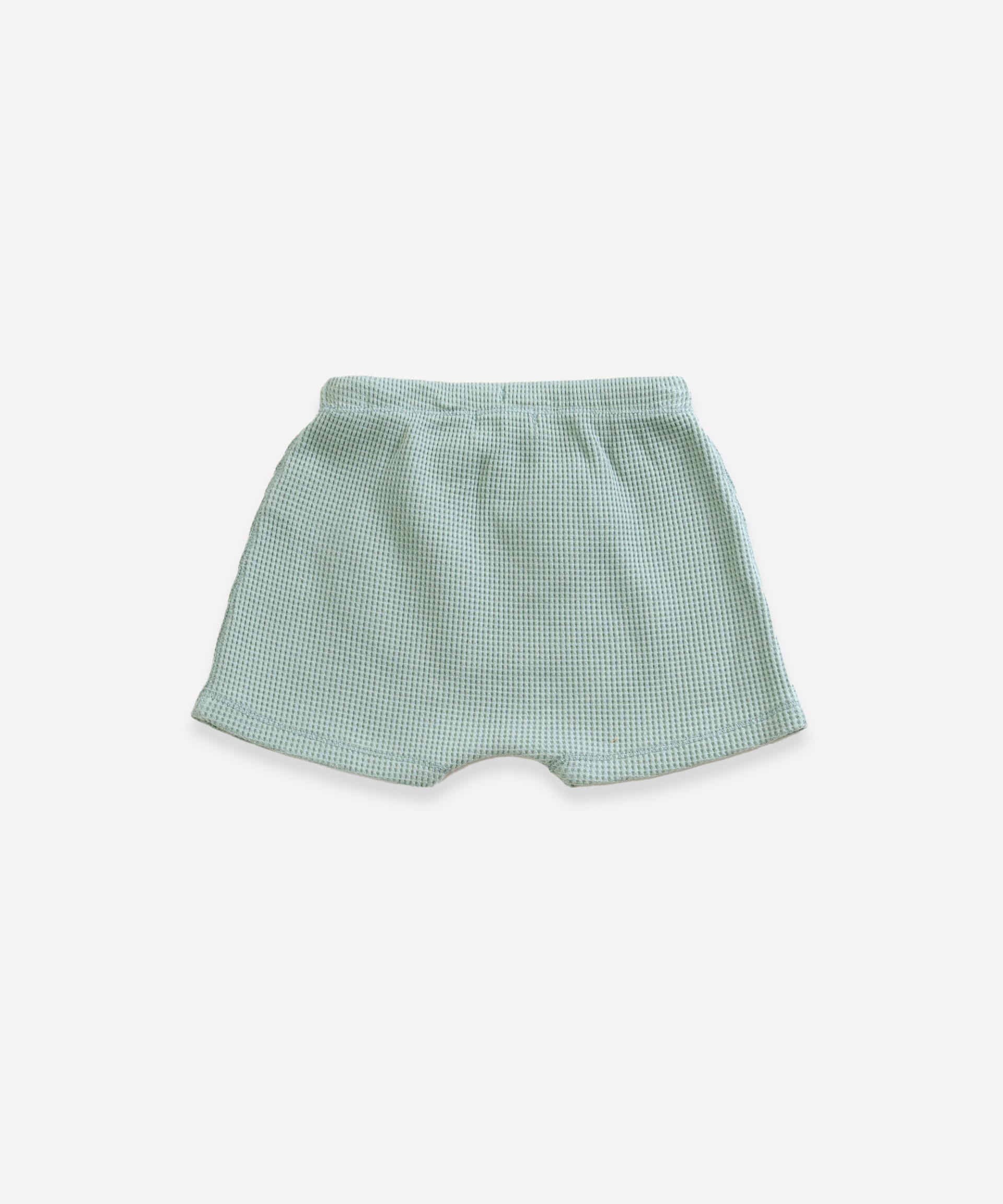 Pantal�n corto de algod�n org�nico con bolsillo estilo canguro | Weaving