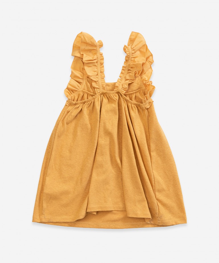 Vestido de al�as com folhos