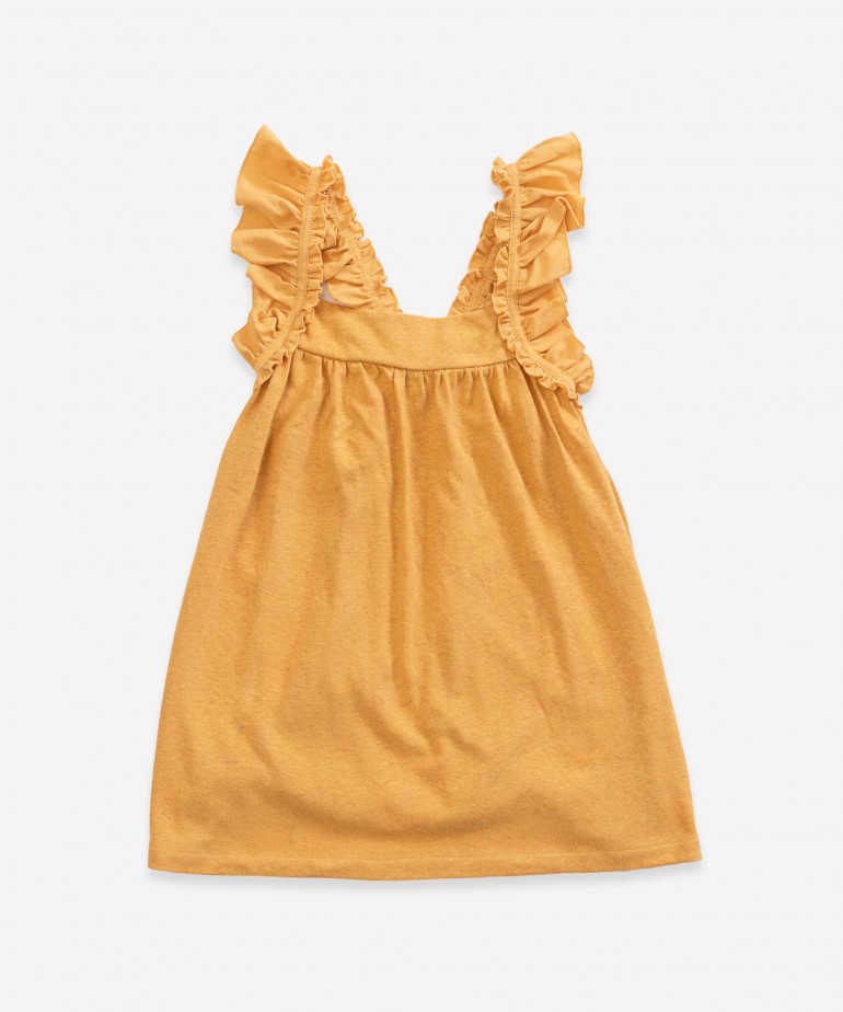 Vestido de al�as com folhos