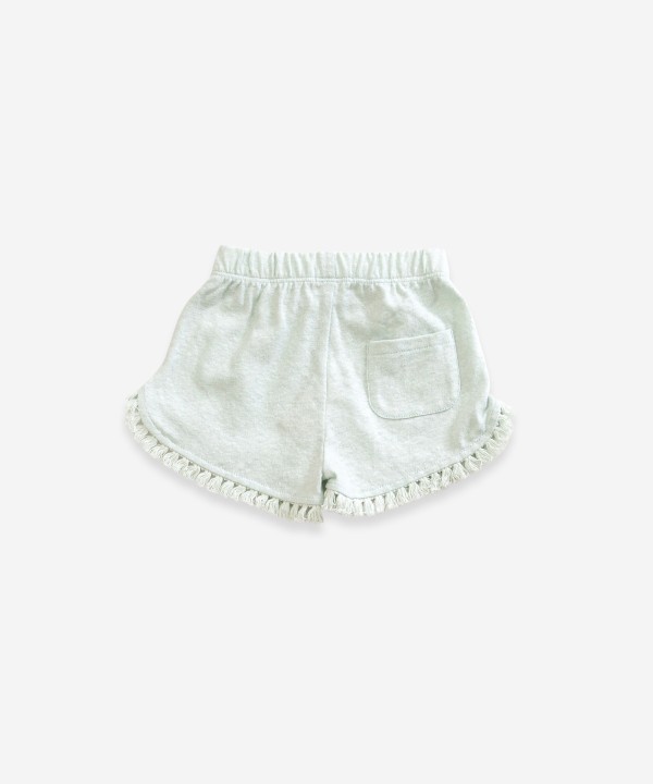 Pantalón corto con flecos