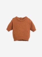 Pull en tricot avec ouverture dans le dos
