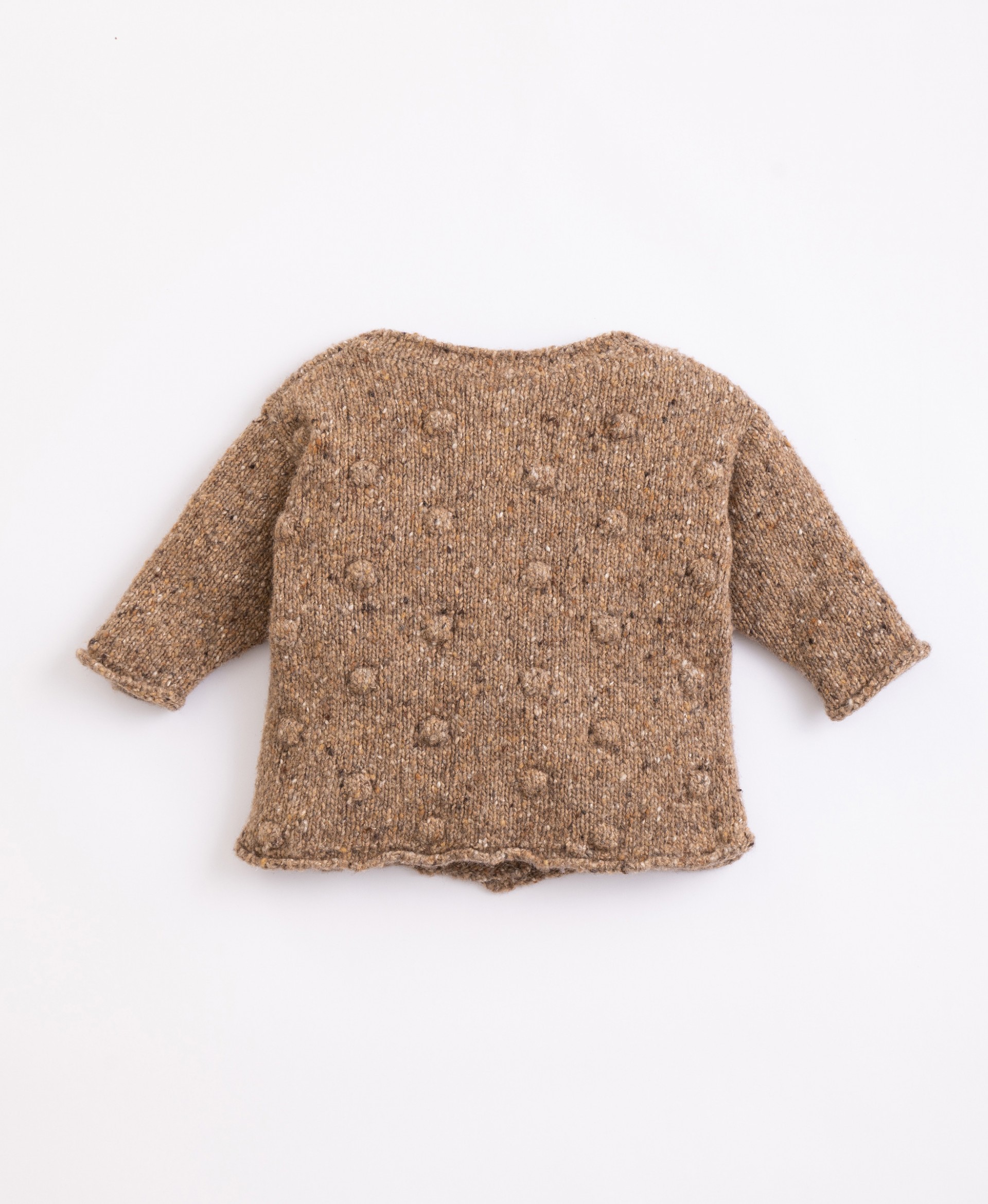 Casaco tricot com fibras recicladas | Illustration