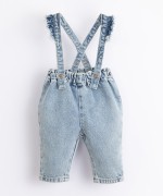 Denim dungarees with frill on the straps | Illustration
