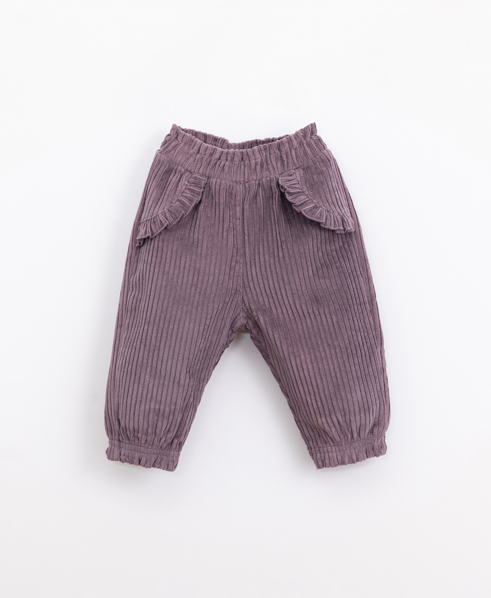 Corduroy trousers with false pockets | Illustration
