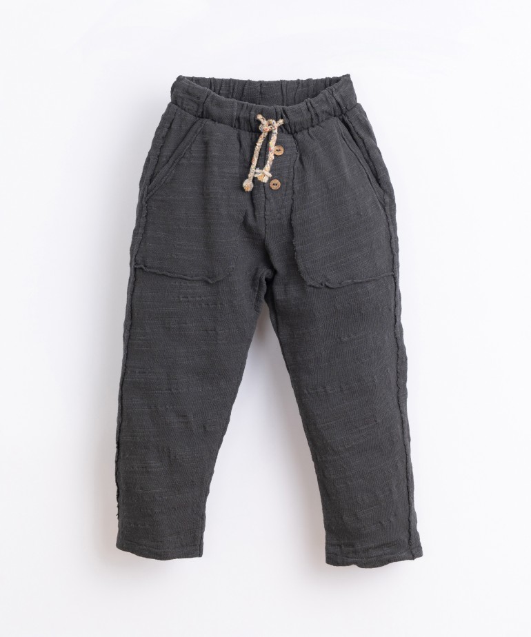 Trousers in organic cotton and recycled cotton