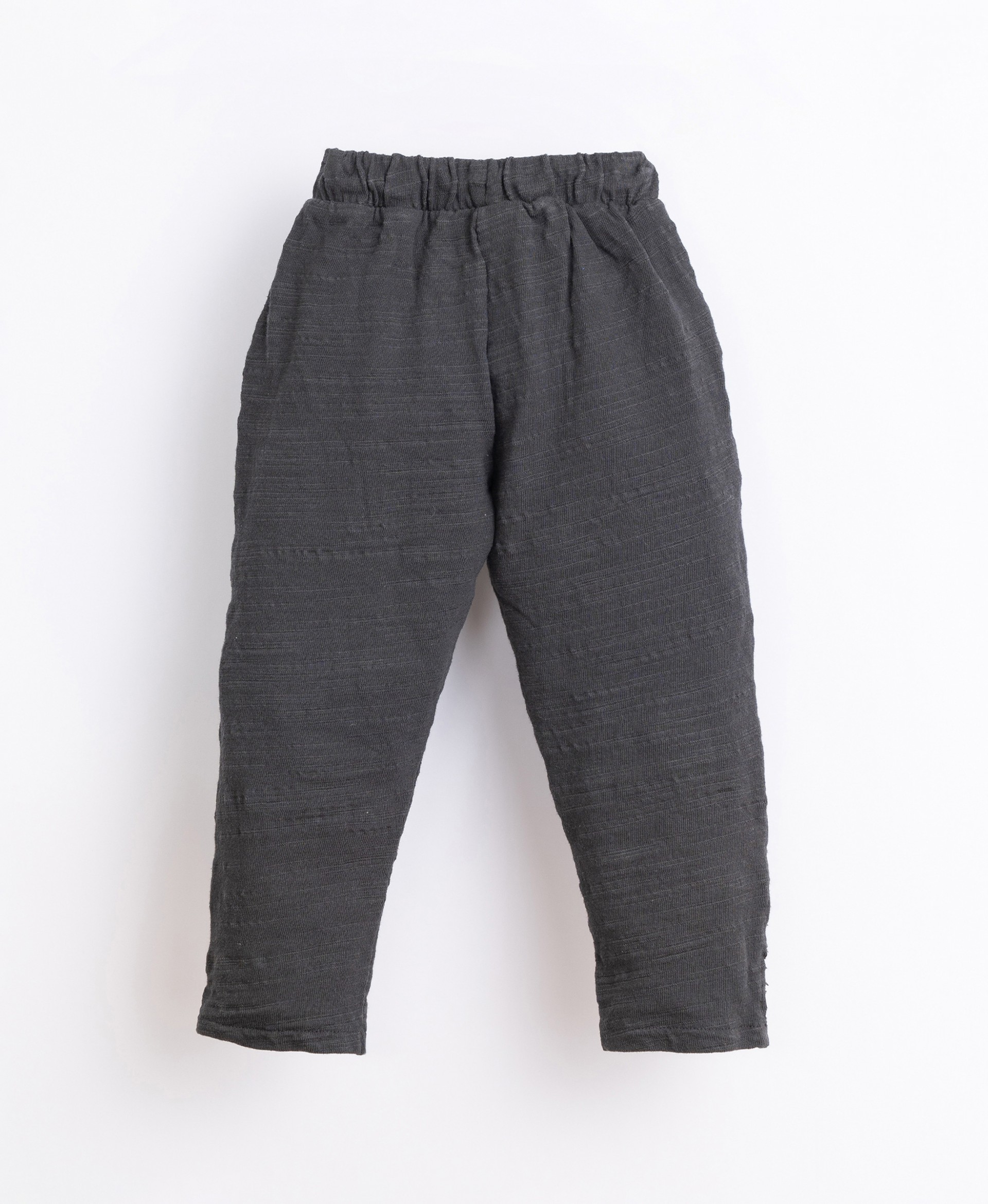 Pantaloni con bottoni decorativi | Illustration