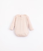 Body in cotone organico con apertura in molle | Illustration
