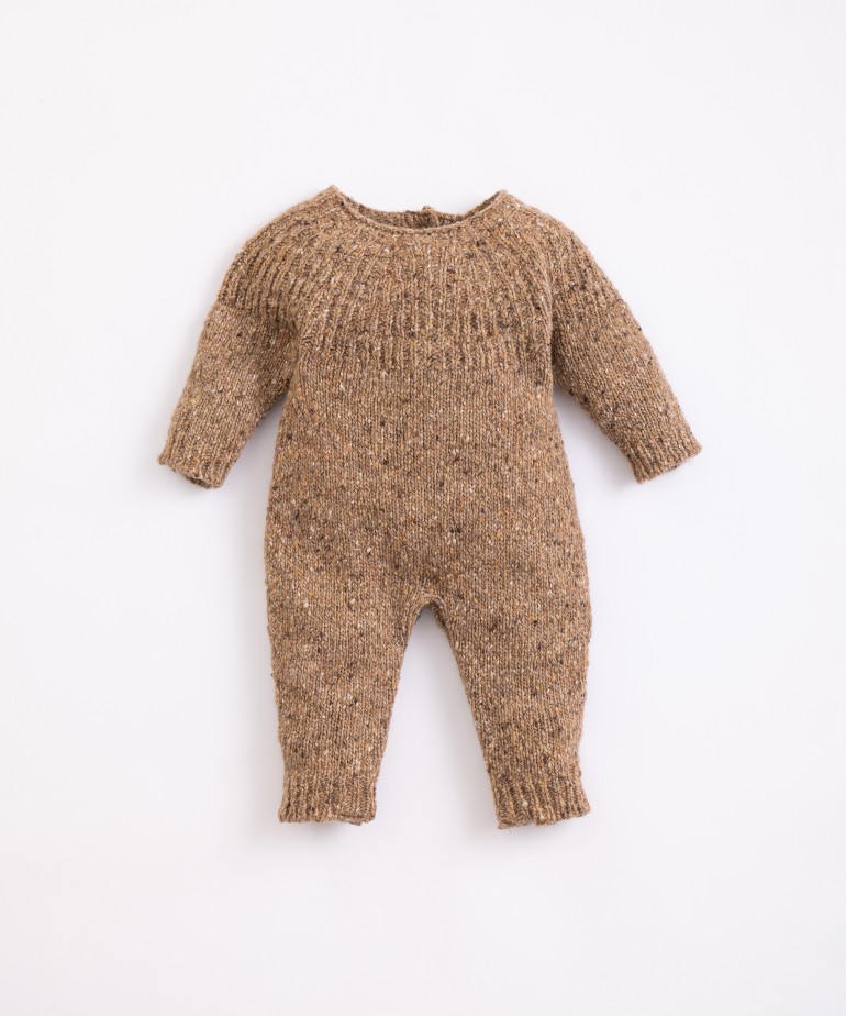 Knitted jumpsuit with back opening