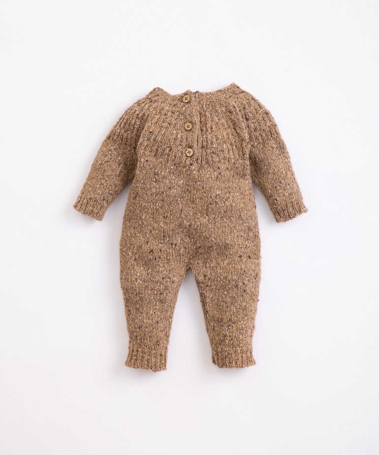 Knitted jumpsuit with back opening