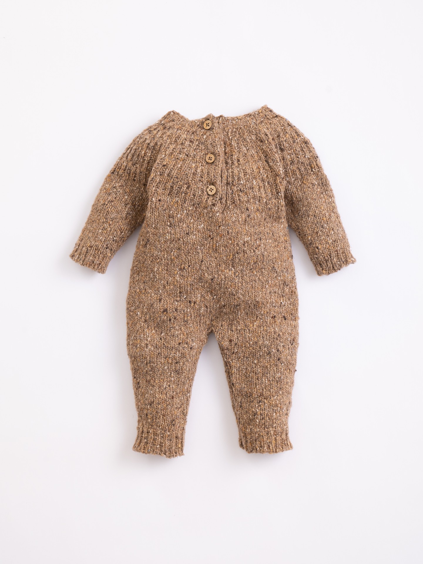 Knitted jumpsuit with back opening
