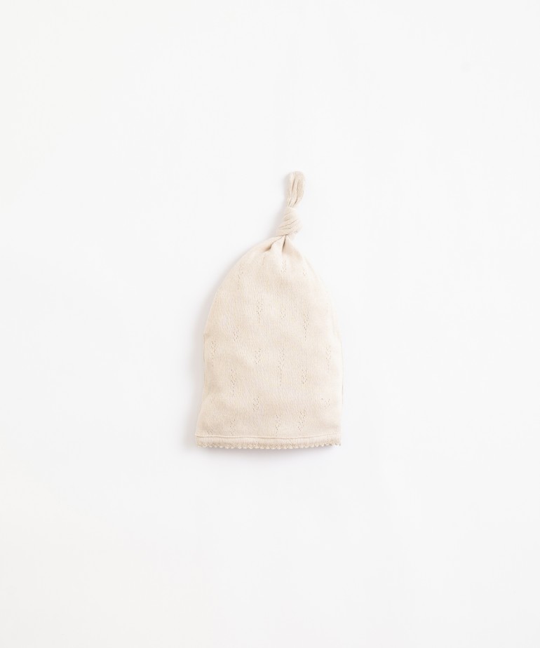Beanie in organic cotton with ajour pattern