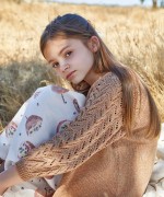 Knit jacket with coconut shell buttons | Basketry