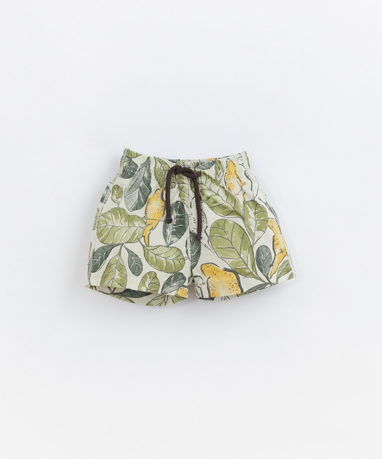 Swimming trunks with parakeet print