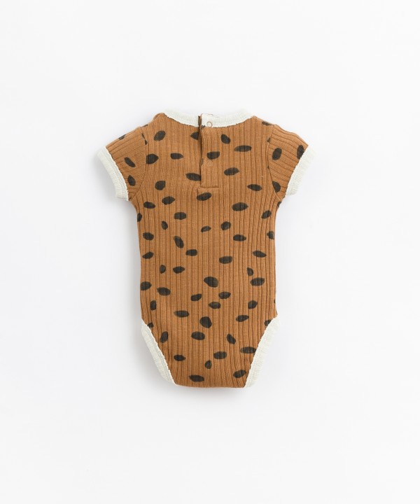 Body in cotone organico con stampa