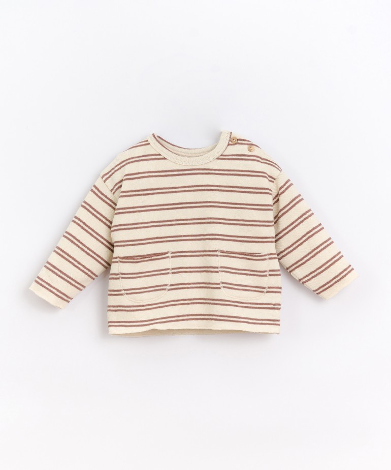 Striped sweater with front pockets