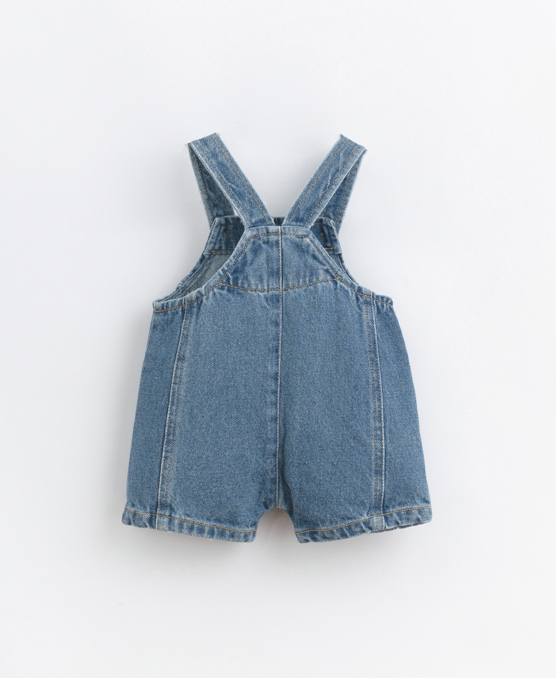 Denim jumpsuit with coconut shell buttons | Basketry