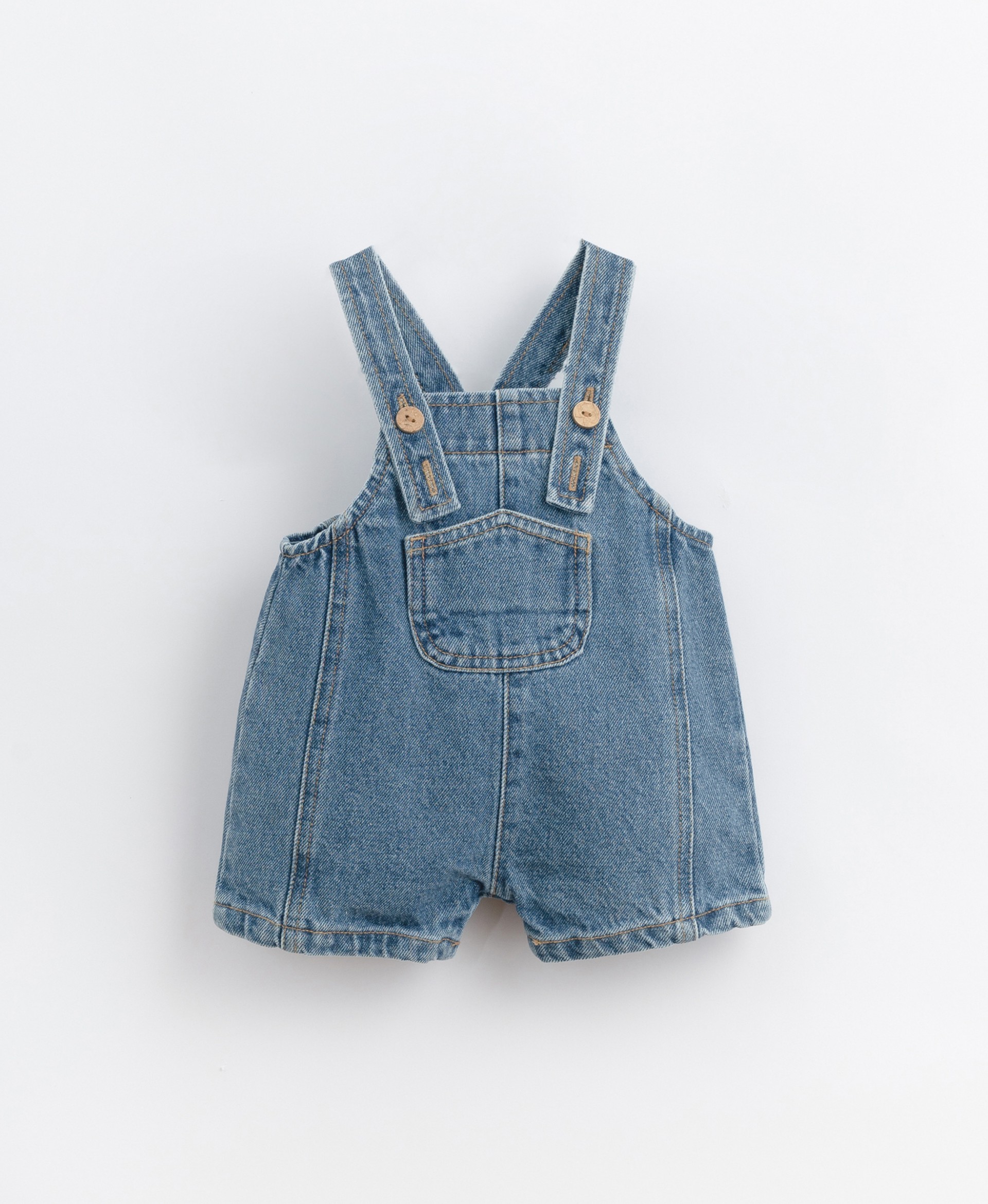 Denim jumpsuit with coconut shell buttons | Basketry