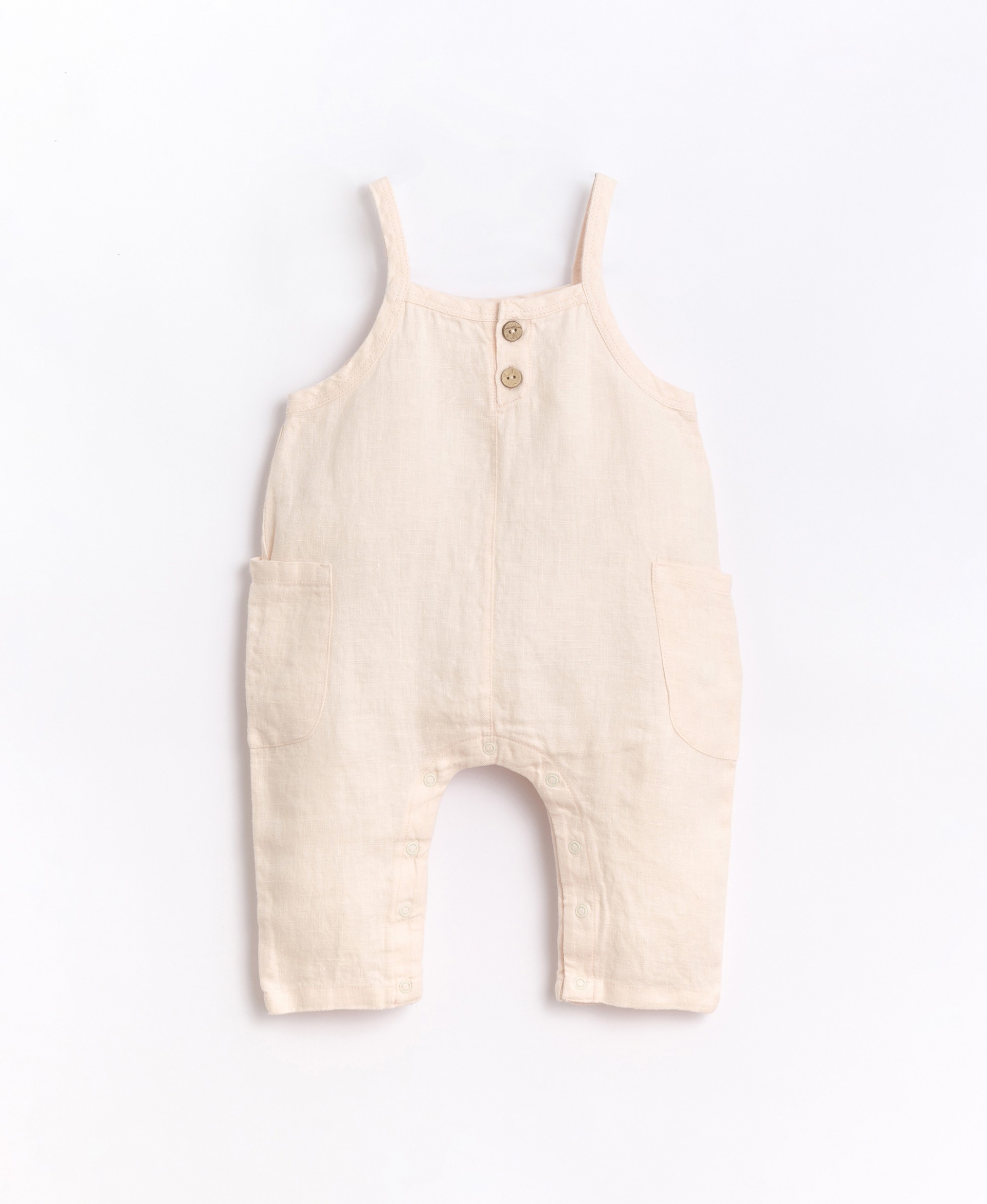 Linen jumpsuit with coconut shell buttons | Basketry