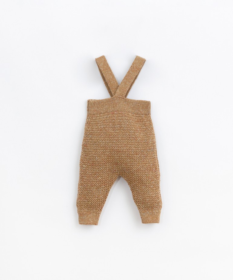 Knitted jumpsuit in yarn blended of cotton and recycled fibers