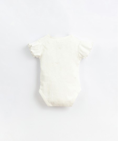 Body in organic cotton with ruffle on the shoulders