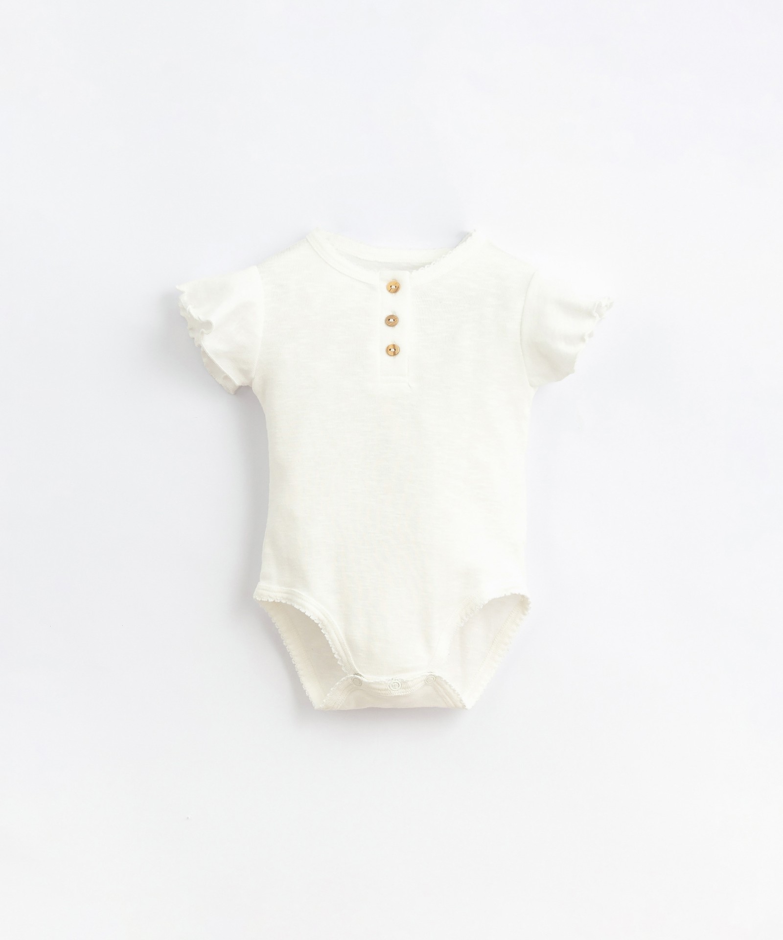 Body in organic cotton with ruffle on the shoulders