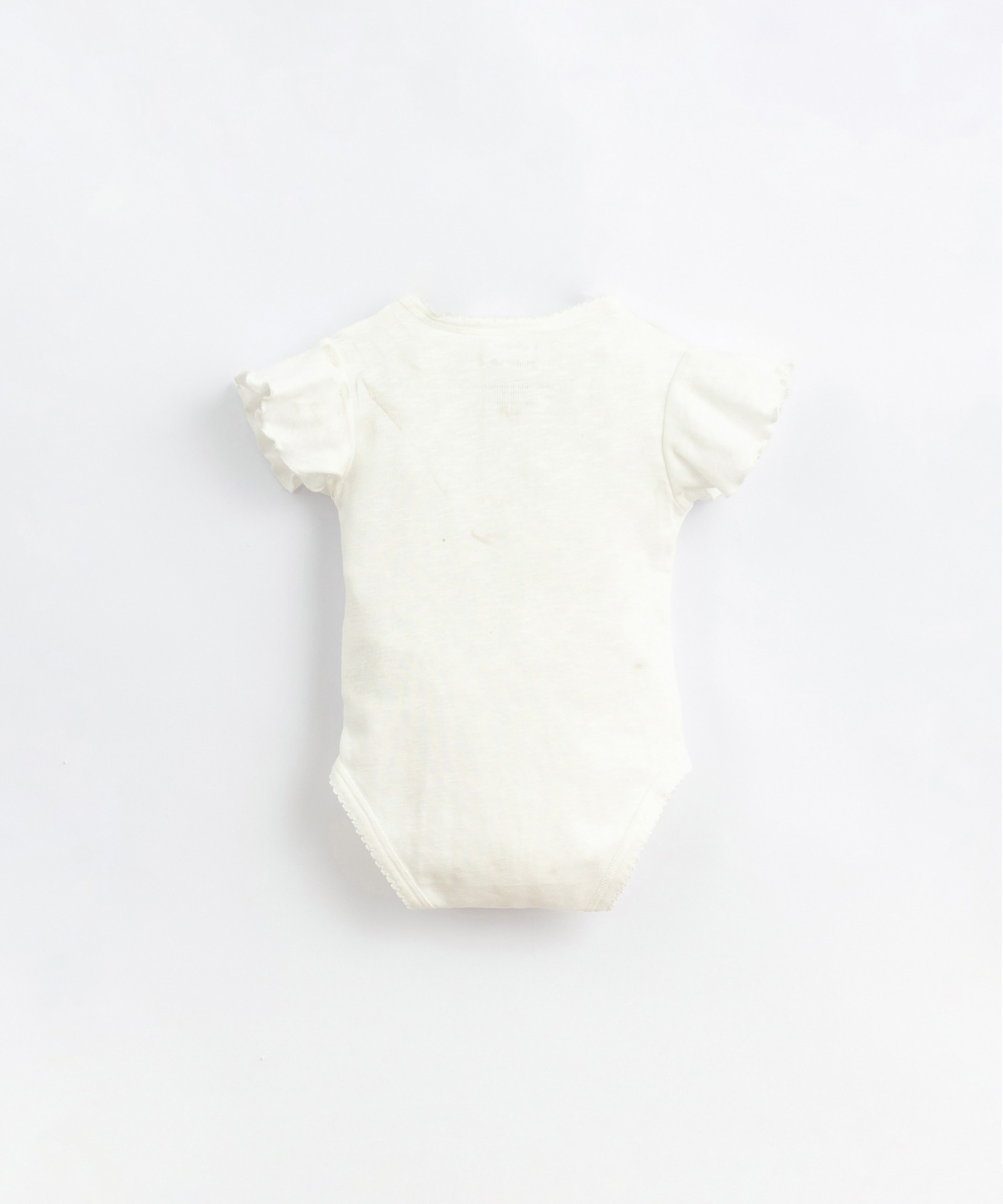 Body in organic cotton with ruffle on the shoulders