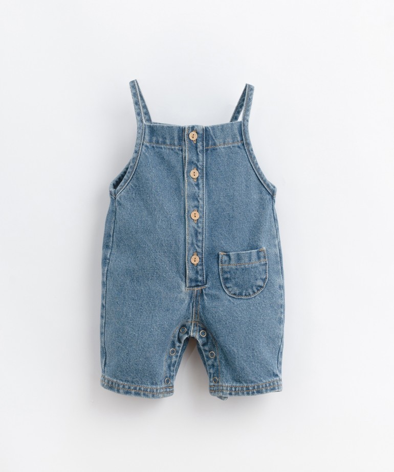 Denim dungarees with coconut shell buttons