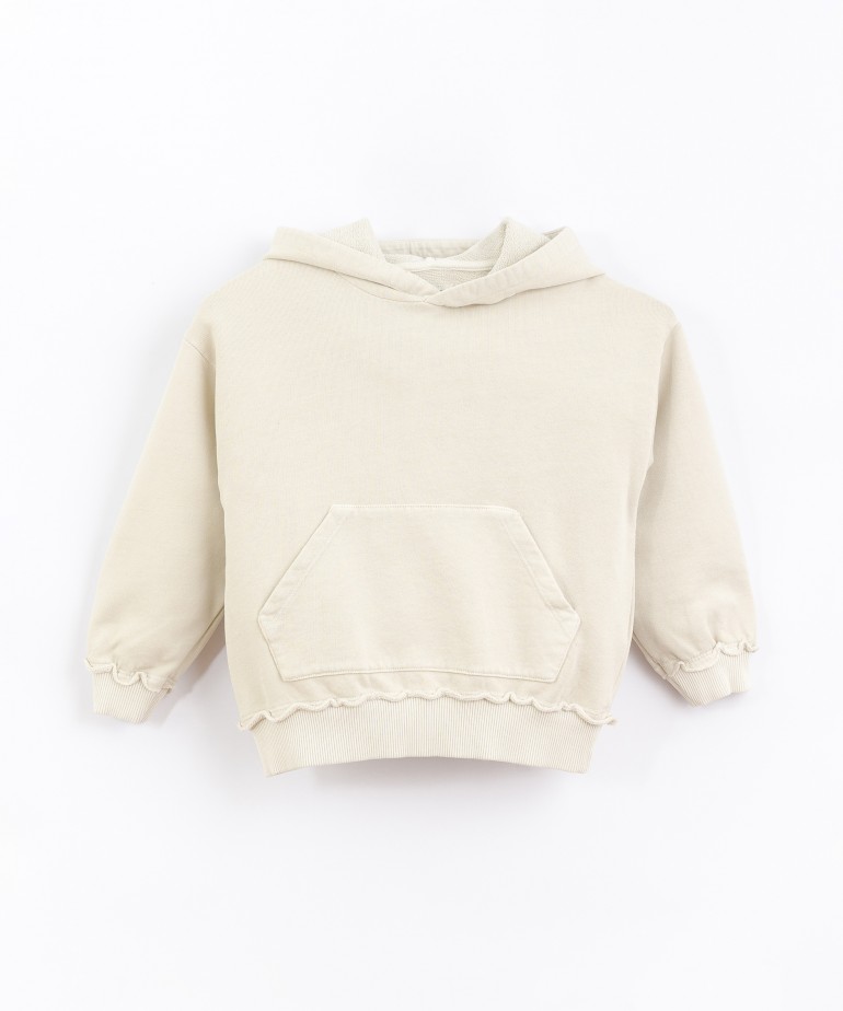 Sweater with hood and front pocket