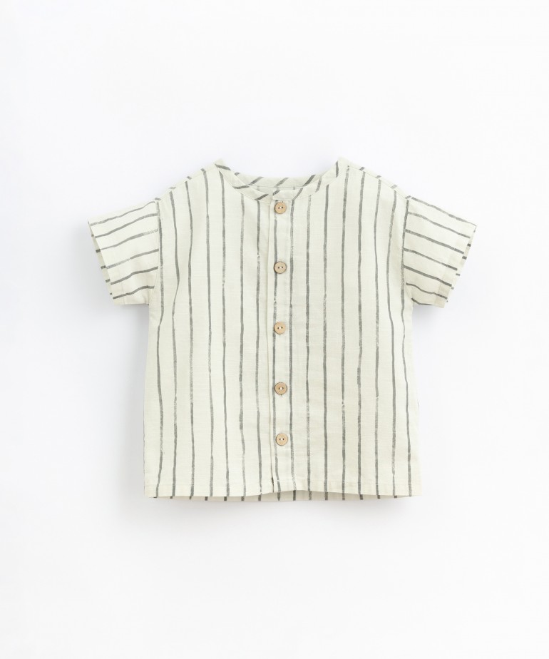 Striped shirt with coconut shell buttons