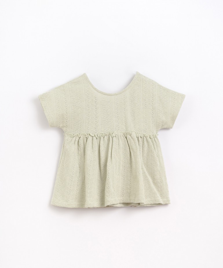 Tunic in organic cotton with crossed detail at the back