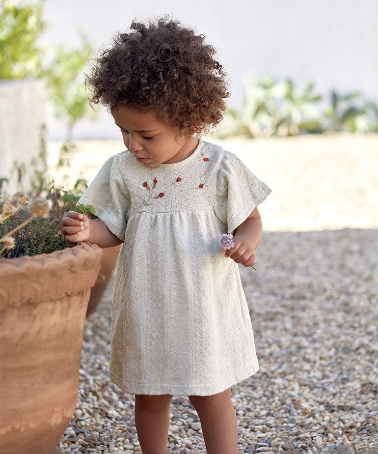 Dress in organic cotton with embroidered bodice