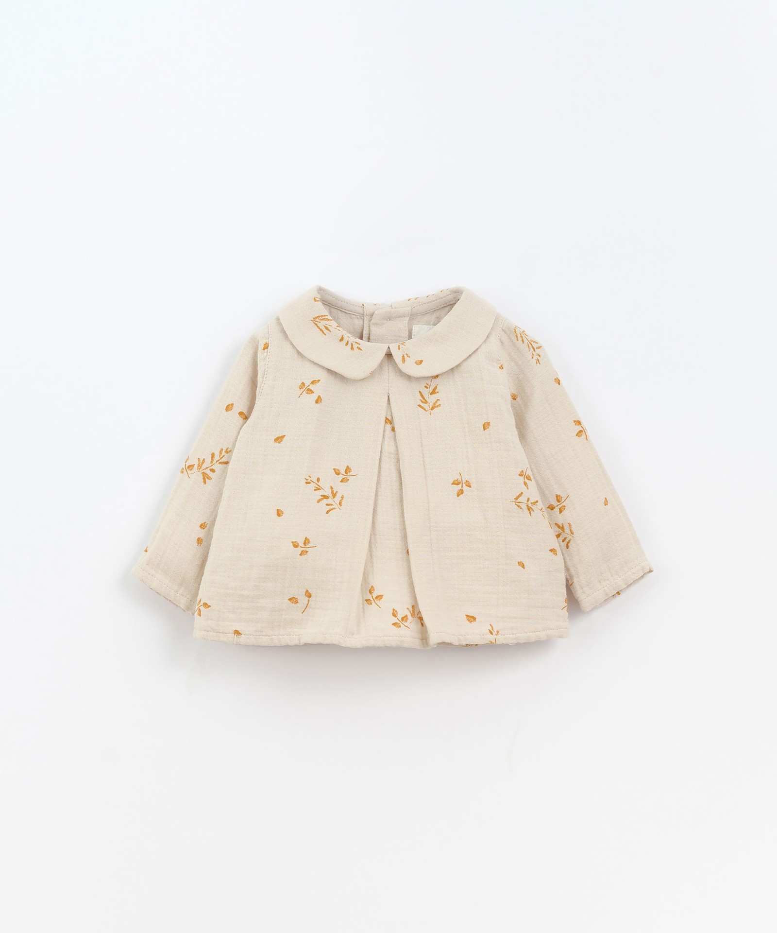 Blusa de tela con estampado de ramitas