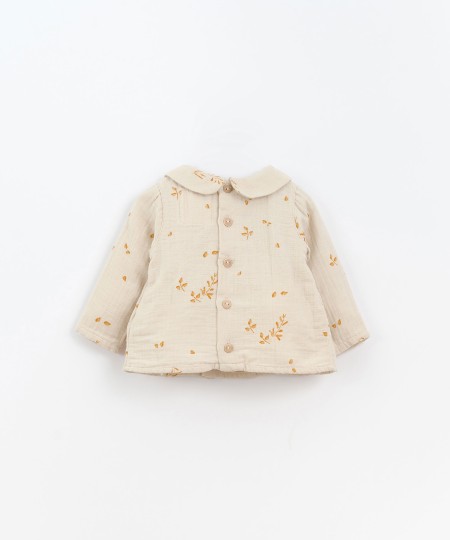 Blusa in tessuto con stampa a rametti