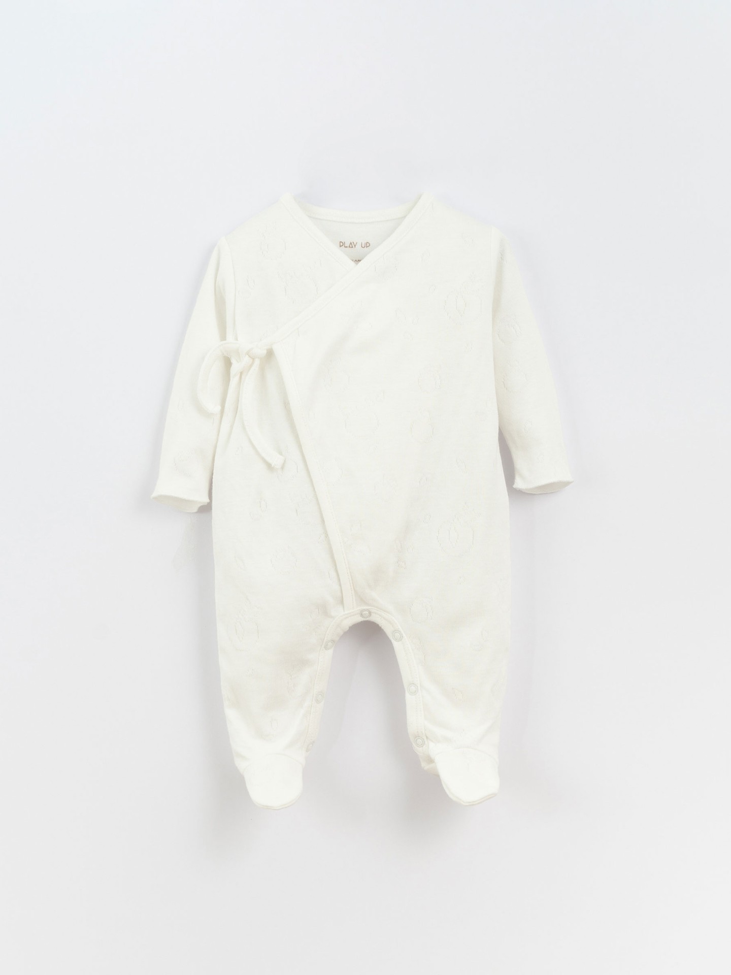 Mono con abertura cruzada