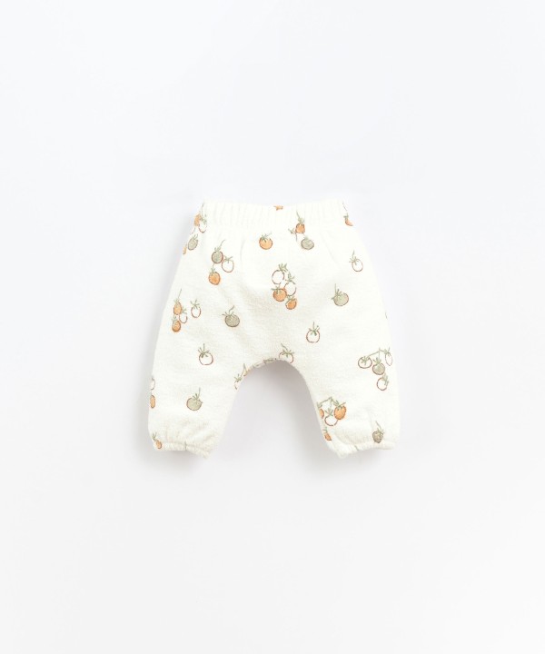 Organic cotton trousers with tomatoes print