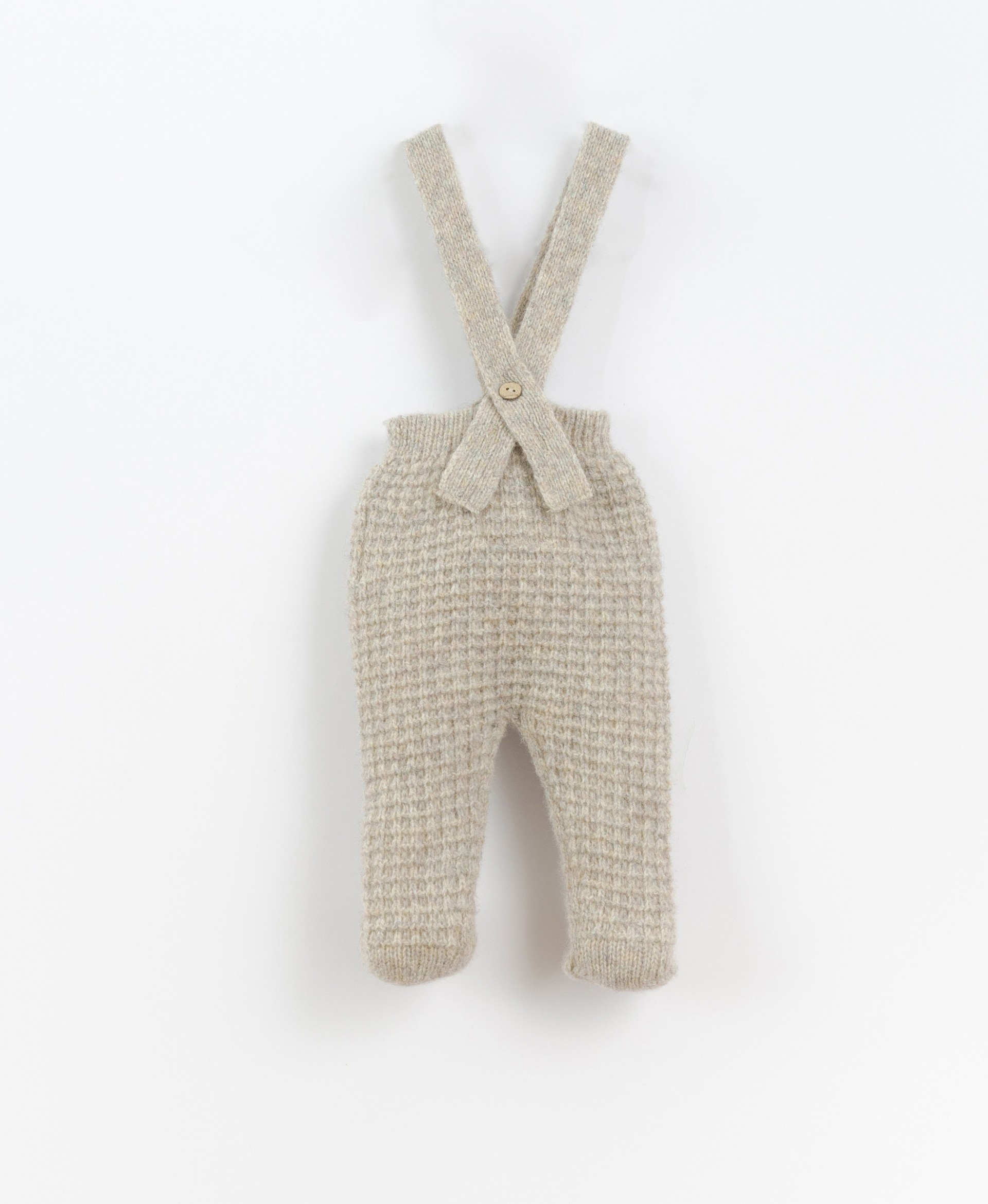 Knitted trousers with shoulder straps | Culinary