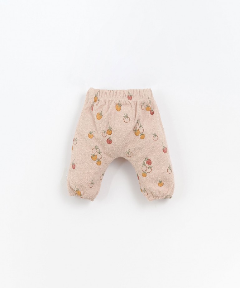 Organic cotton trousers with tomatoes print