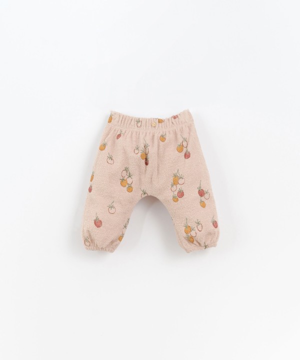 Organic cotton trousers with tomatoes print