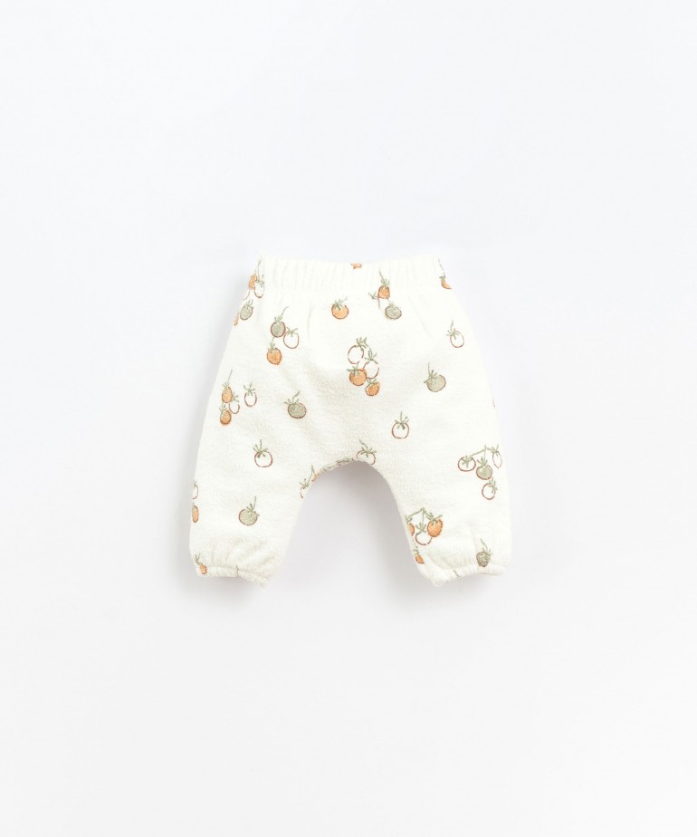 Pantaln de algodn orgnico con estampado de tomates