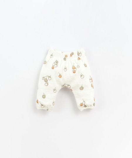 Organic cotton trousers with tomatoes print
