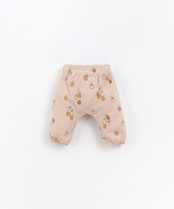 Organic cotton trousers with tomatoes print