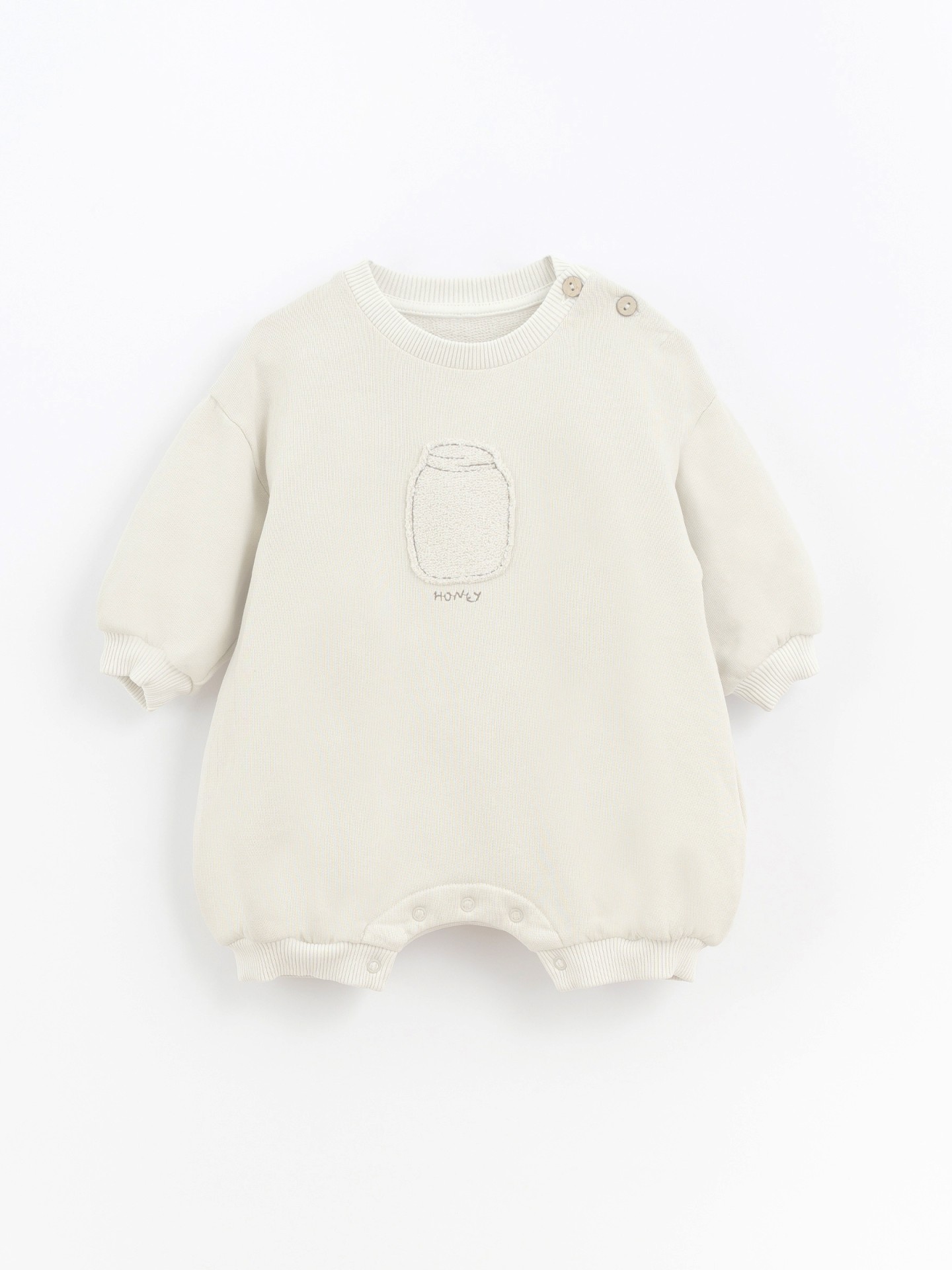 Mono com encaje en el pecho