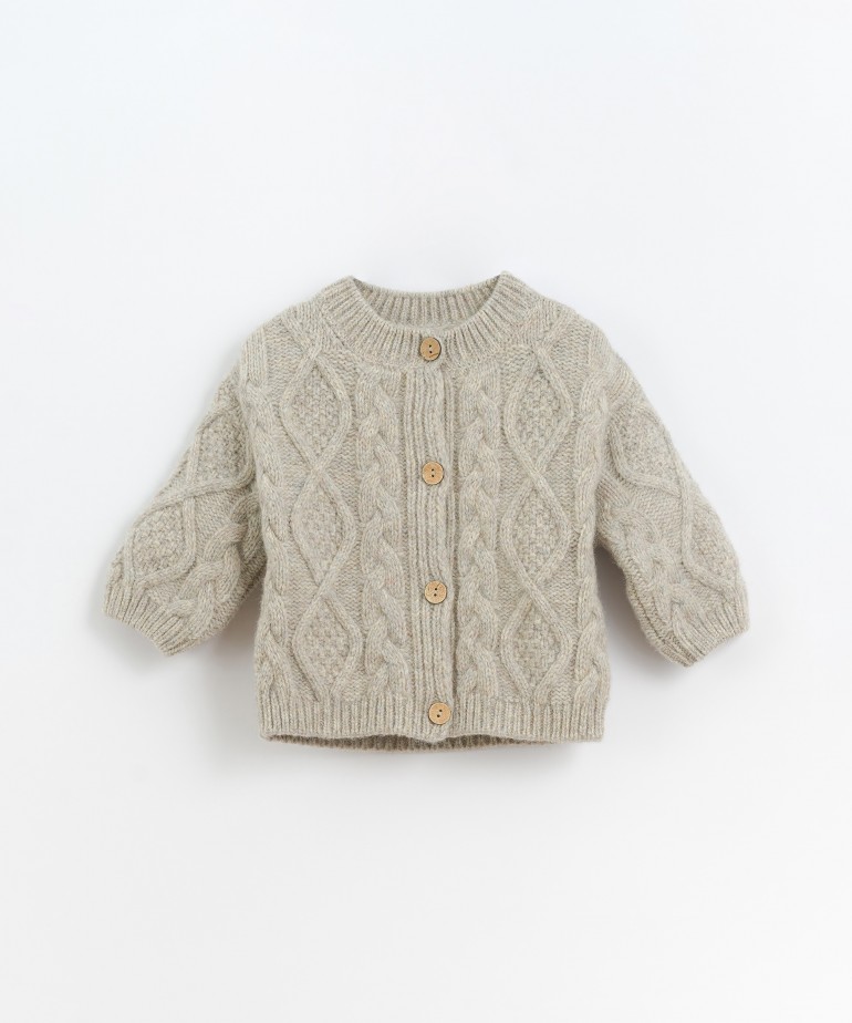Knitted jacket with pleated details