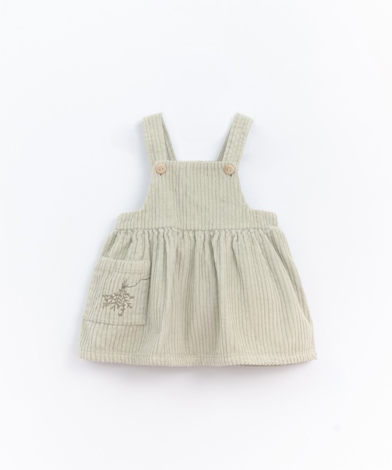 Corduroy dress with embroidery on the pocket