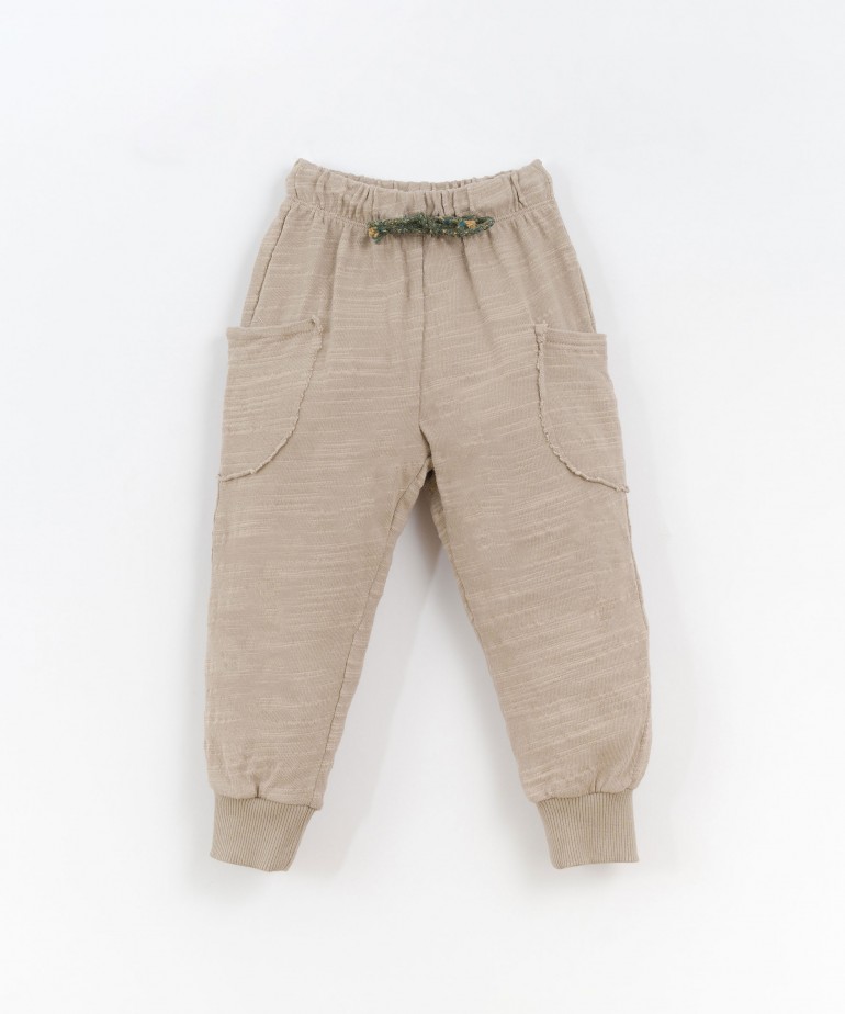 Jersey stitch trousers with side pockets