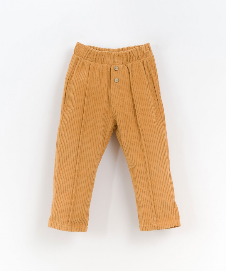 Corduroy trousers with coconut buttons