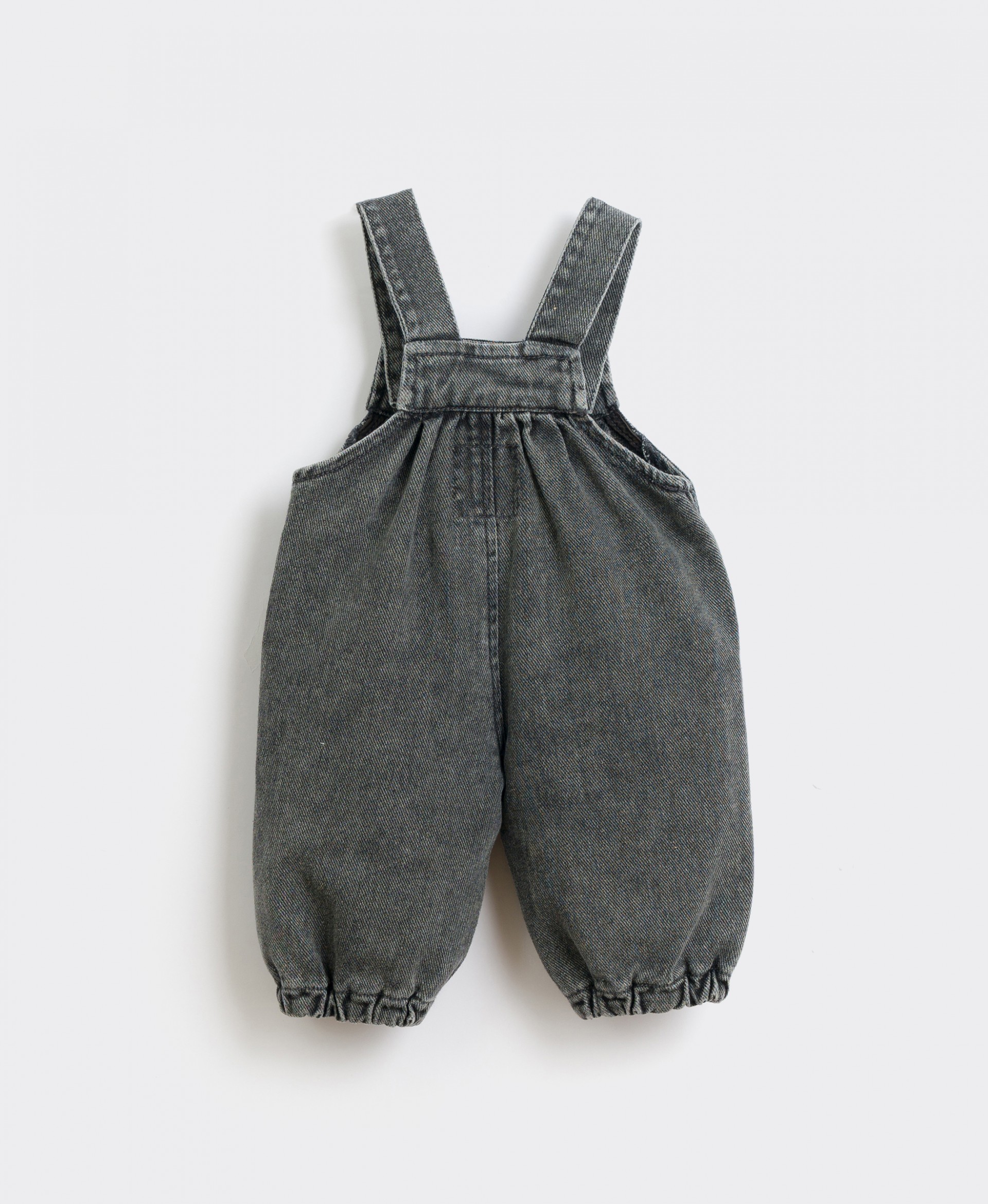 Denim jumpsuit with coconut buttons | Culinary