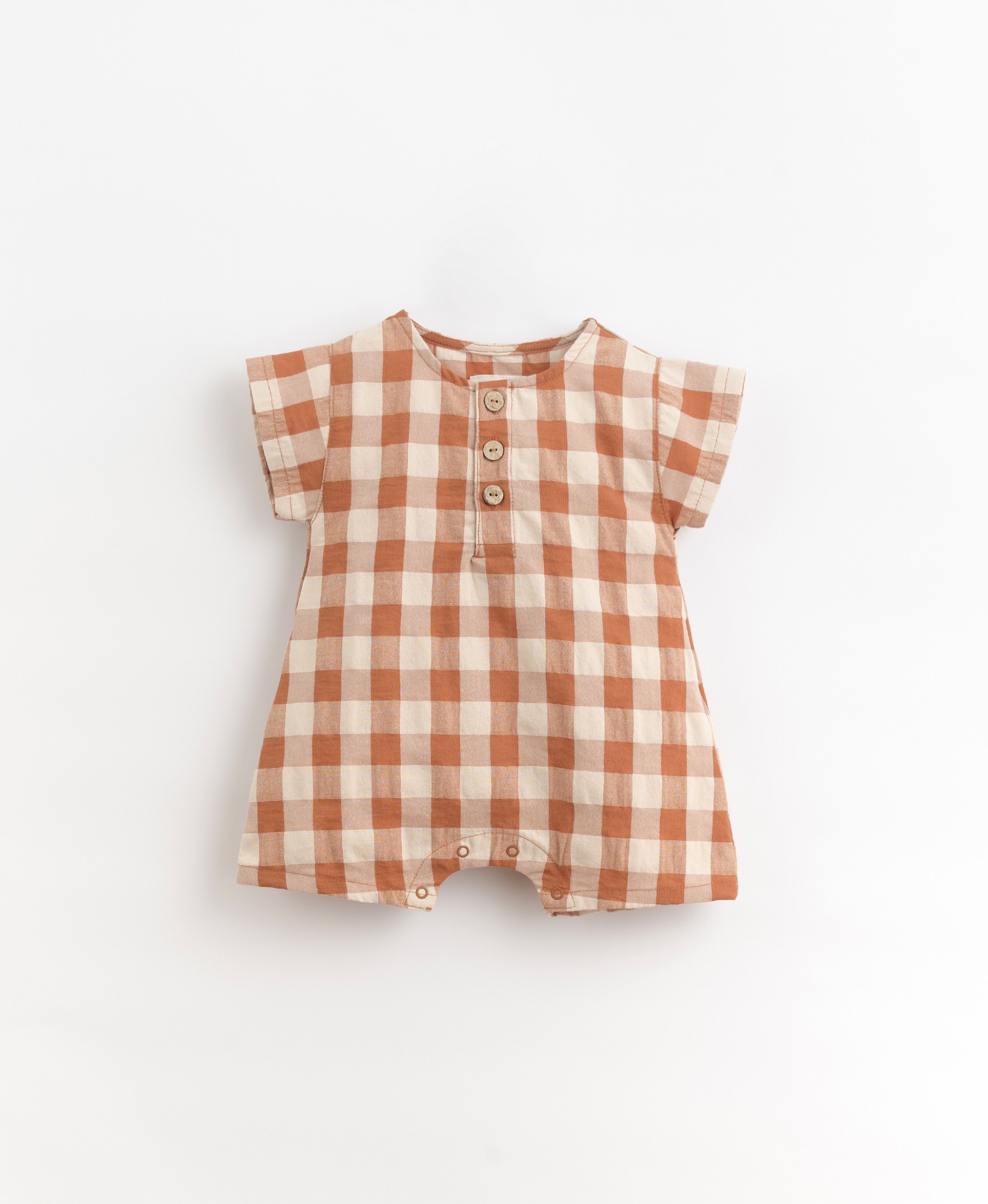 Short-sleeved jumpsuit with coconut buttons | Organic Care