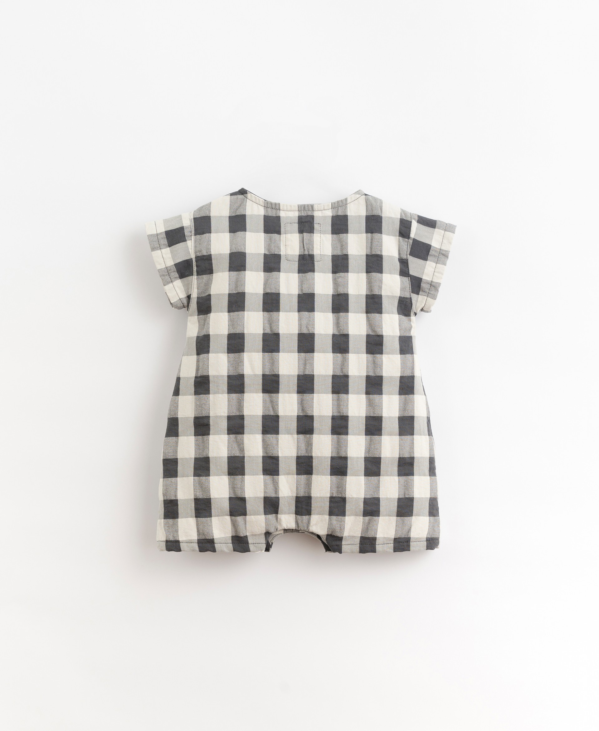 Short-sleeved jumpsuit with coconut buttons | Organic Care