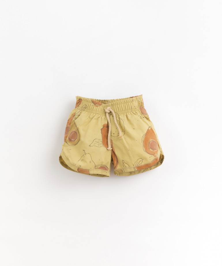 Jersey stitch swimming shorts with avocado print